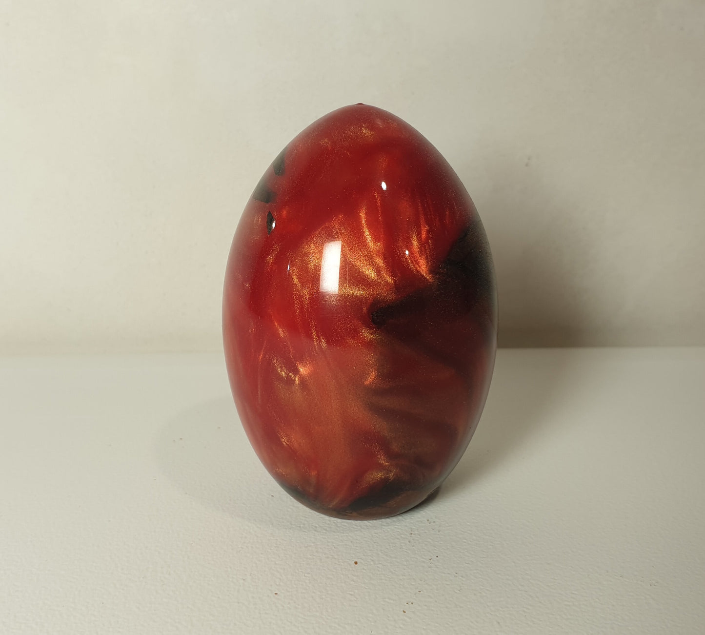 Small Iron Wood & Red/Gold Resin Egg
